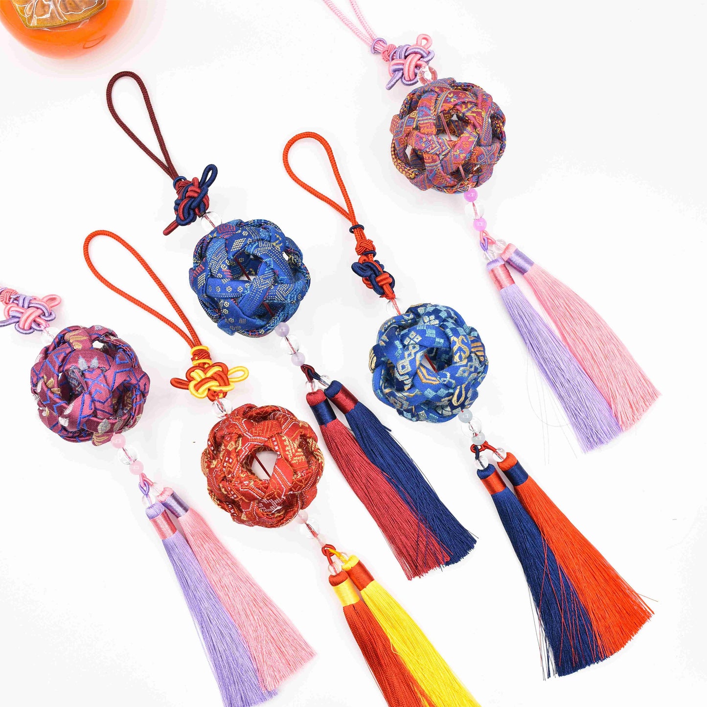 Guangxi Zhuang Brocade: A Blossom-Adorned Hand-Embroidered Ball Ornament
