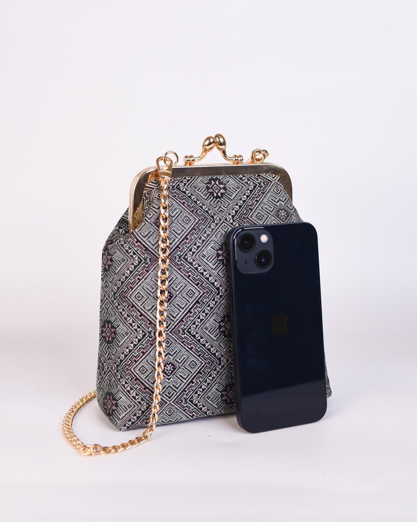 Guangxi Zhuang Brocade Clutch Bag with Smooth Leather Shoulder Strap