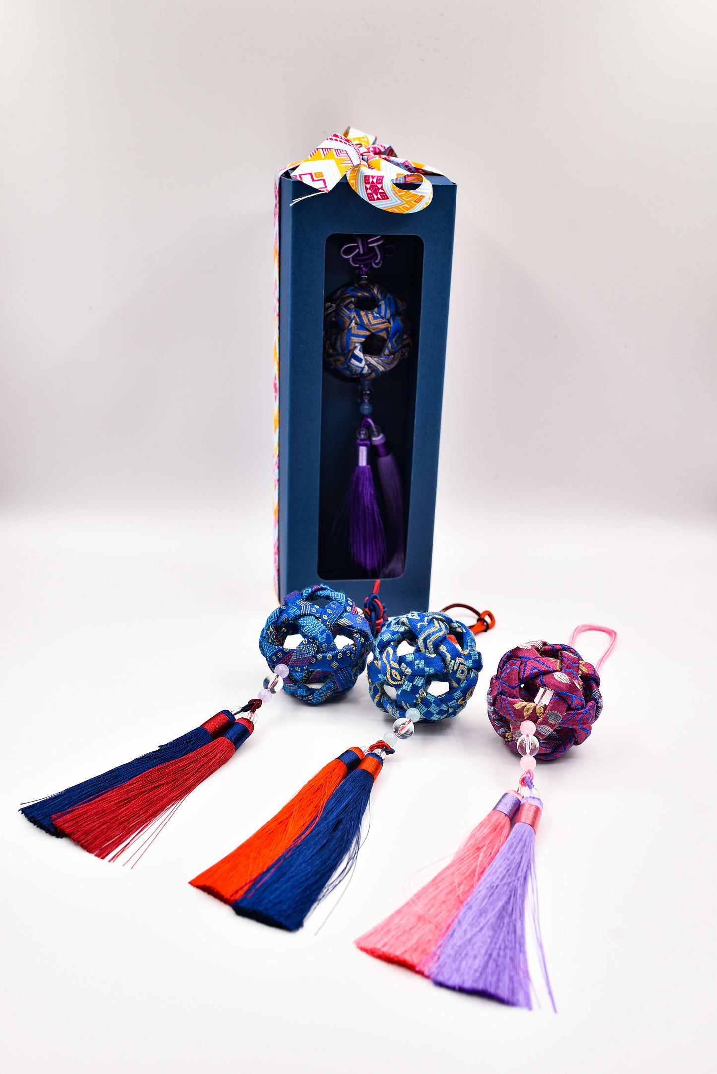 Guangxi Zhuang Brocade: A Blossom-Adorned Hand-Embroidered Ball Ornament
