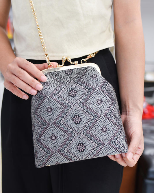 Guangxi Zhuang Brocade Clutch Bag with Smooth Leather Shoulder Strap