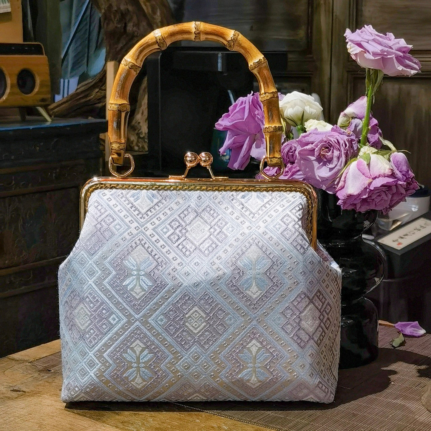 Guangxi Zhuang Brocade Handbag with Gold-Trimmed Bamboo Handle