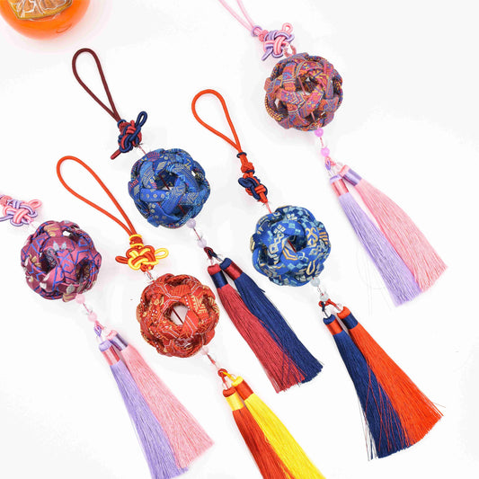 Guangxi Zhuang Brocade: A Blossom-Adorned Hand-Embroidered Ball Ornament
