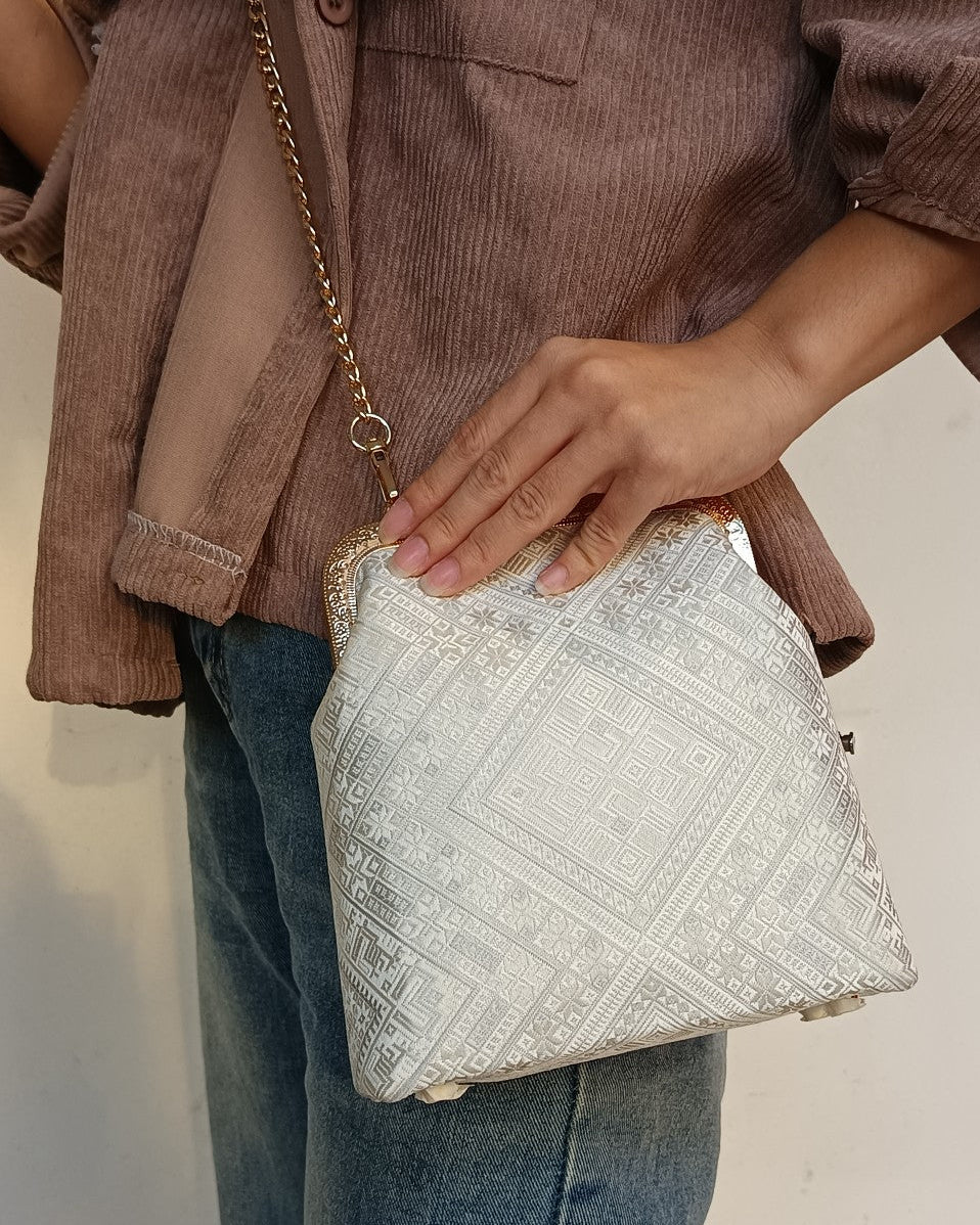Guangxi Zhuang Brocade Clutch Bag with Smooth Leather Shoulder Strap