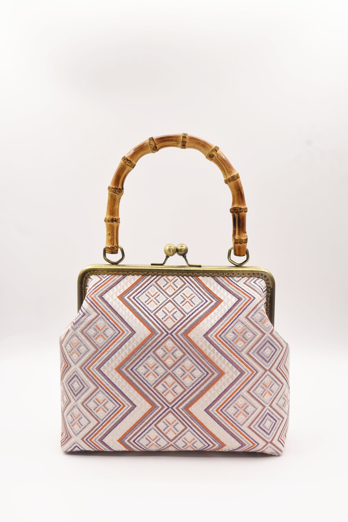 Guangxi Zhuang Brocade Handbag with Gold-Trimmed Bamboo Handle
