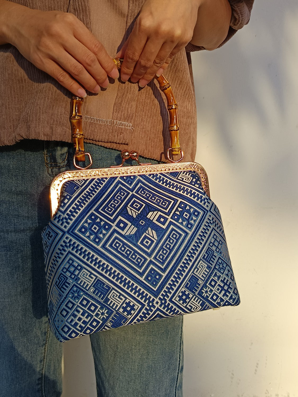 Guangxi Zhuang Brocade Handbag with Gold-Trimmed Bamboo Handle