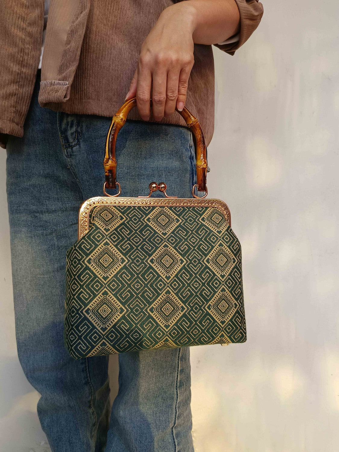 Guangxi Zhuang Brocade Handbag with Gold-Trimmed Bamboo Handle