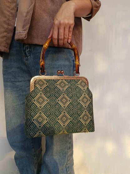Guangxi Zhuang Brocade Handbag with Gold-Trimmed Bamboo Handle
